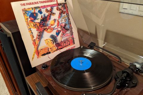 Album Tuff Enuff by The Fabulous Thunderbirds sitting next to a Fluance turntable